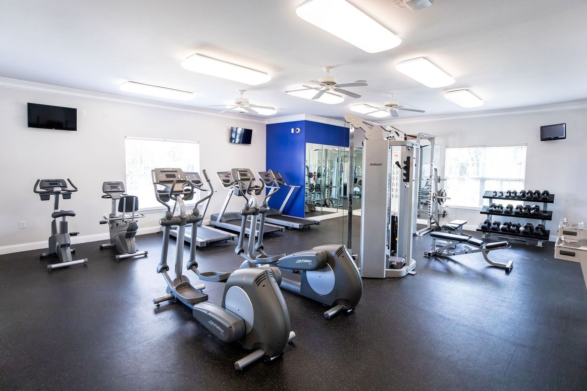 1200 sq. ft. fitness center with cardio and weight lifting equipment.